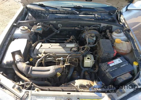 2002 Saturn L-Series L200 из США, поврежденный, VIN 1G8JU54F02Y526485